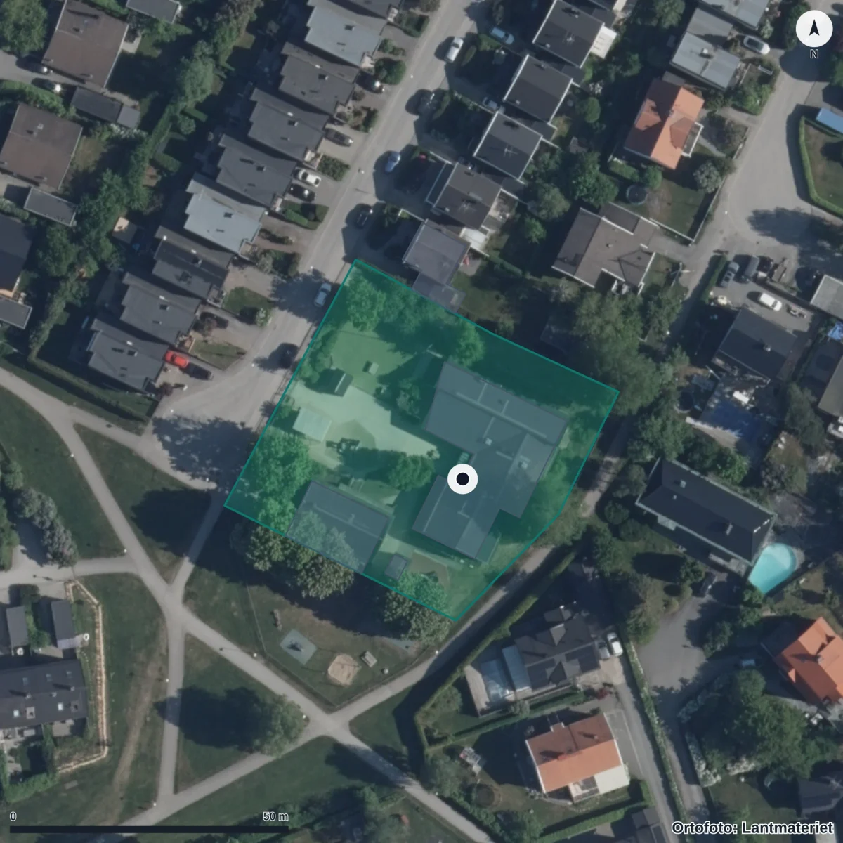 Flygbild över Förskolan Aslögsvägen, ortofoto från Lantmäteriet