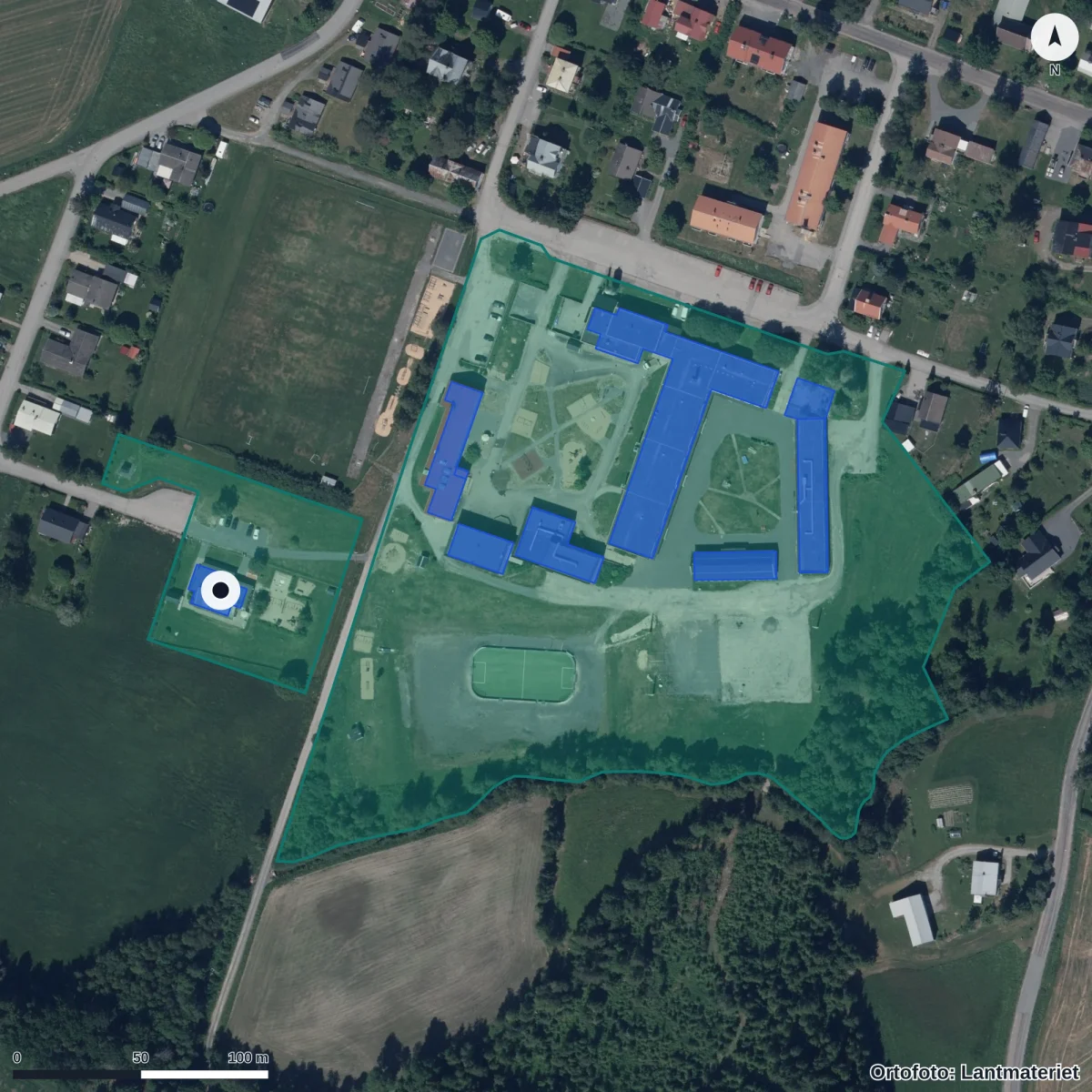 Flygbild över Herrskogs Förskola, ortofoto från Lantmäteriet