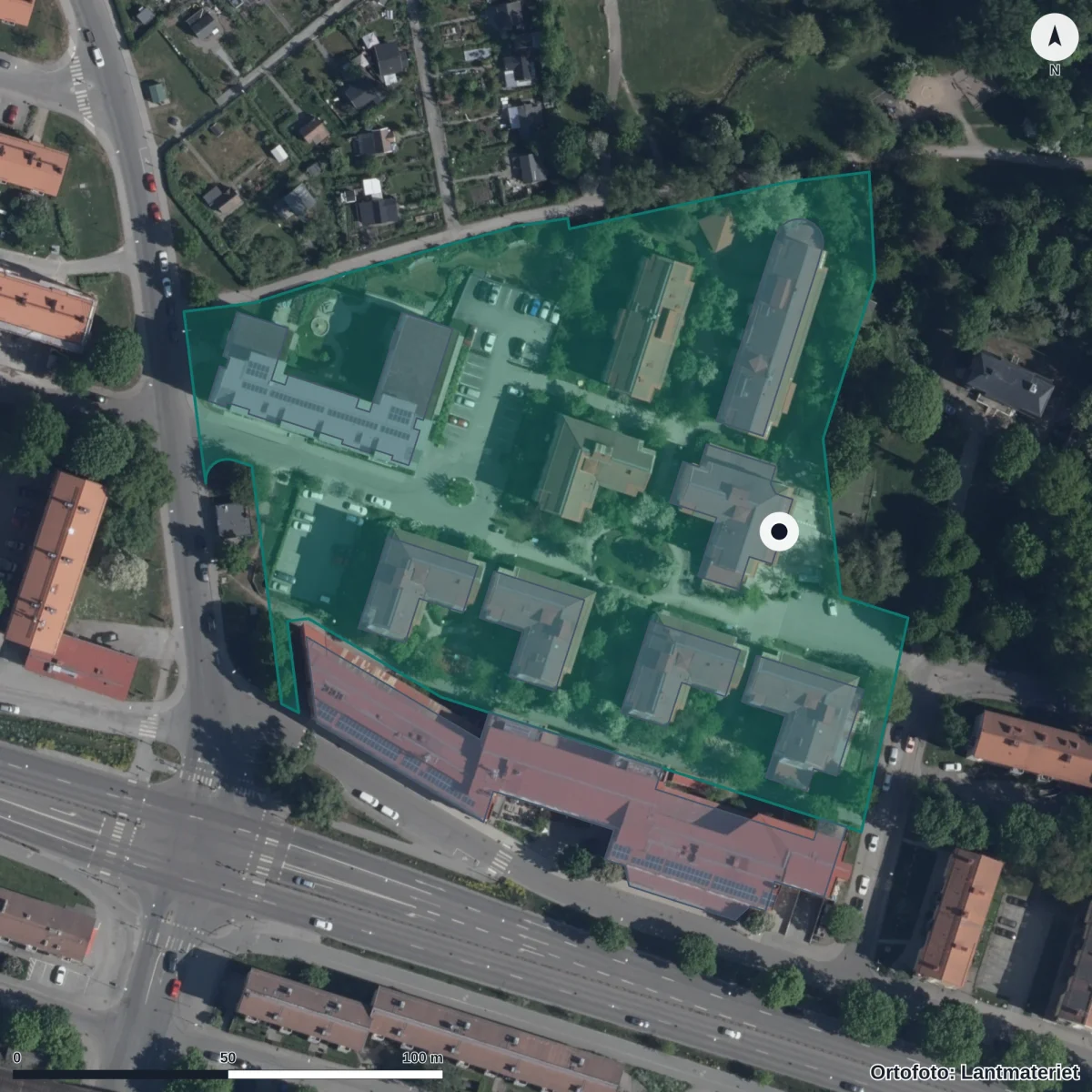 Flygbild över Förskolan Sunnanstigen 11, ortofoto från Lantmäteriet