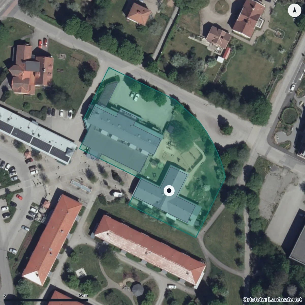 Flygbild över Herrgårdslekens Förskola, ortofoto från Lantmäteriet