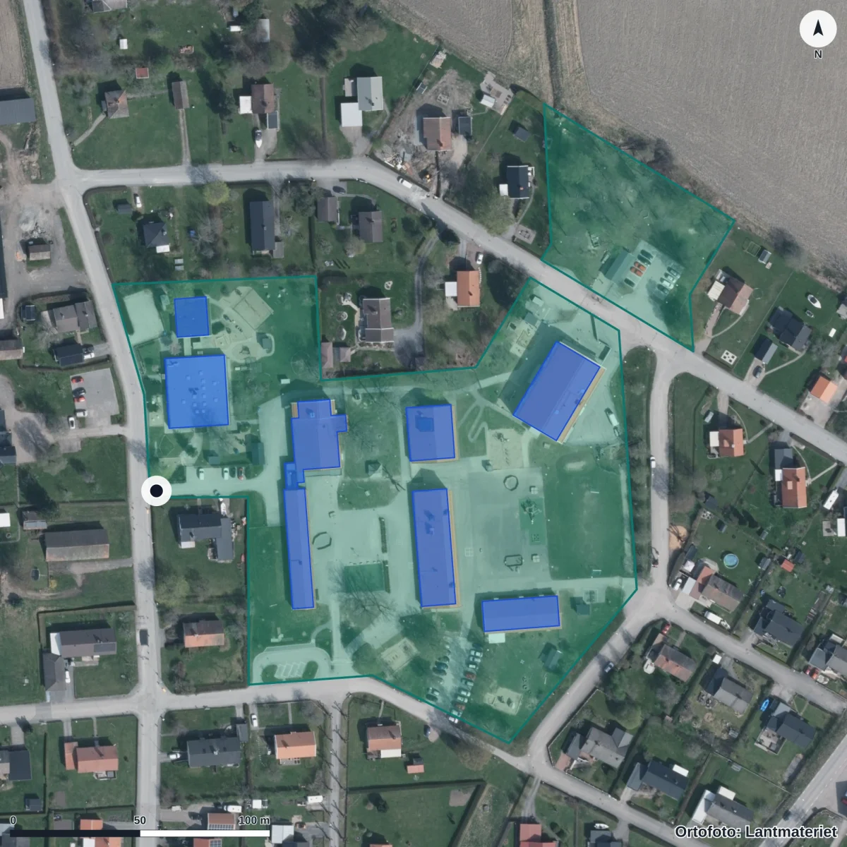 Flygbild över Backagården, ortofoto från Lantmäteriet