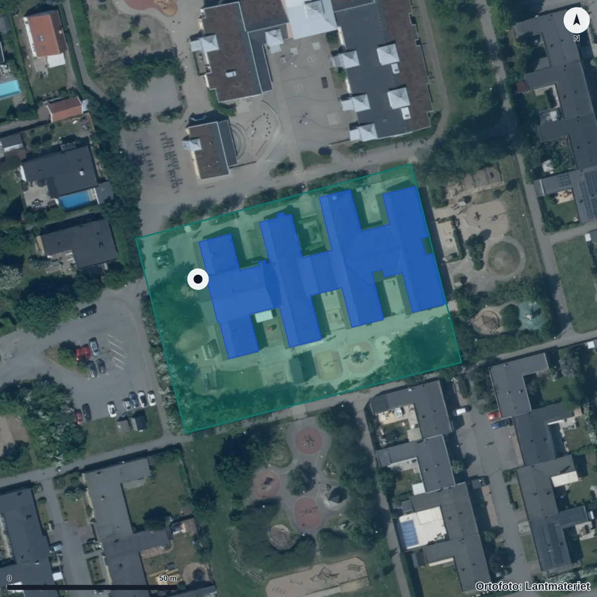 Flygbild över Regnbågens Förskola, ortofoto från Lantmäteriet