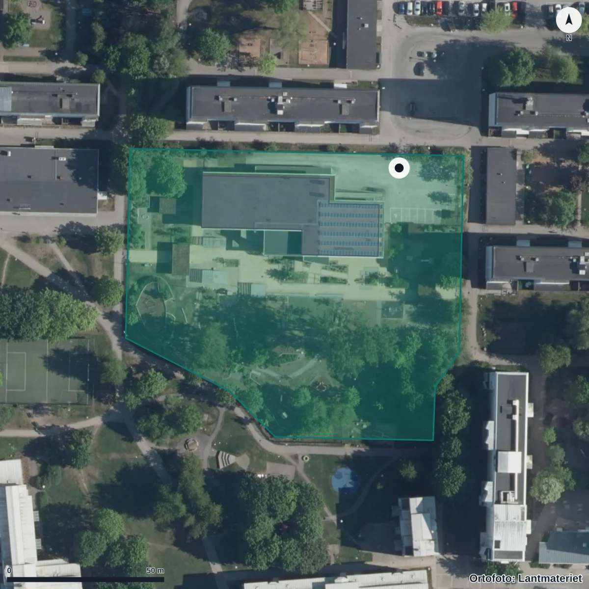 Flygbild över Förskolan Vallmon, ortofoto från Lantmäteriet