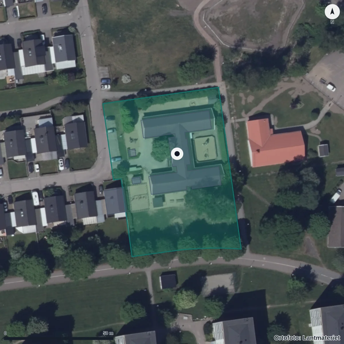 Flygbild över Blåmesen Förskola, ortofoto från Lantmäteriet