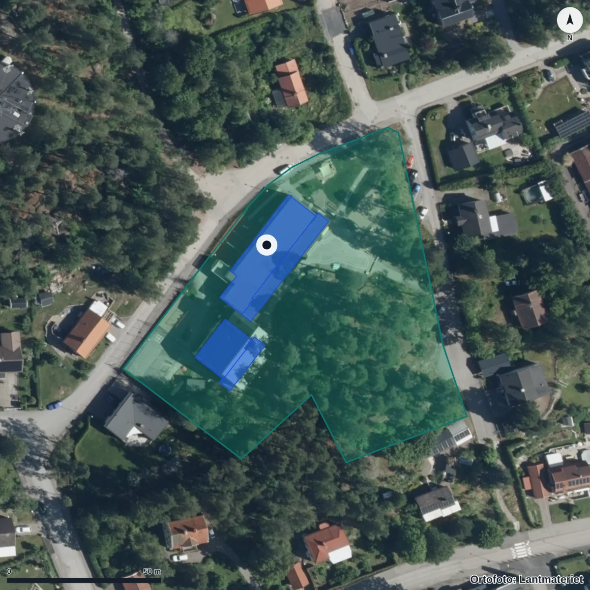 Flygbild över Förskolan Mårbacka, ortofoto från Lantmäteriet