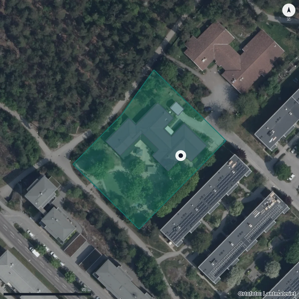Flygbild över Förskolan Mumindalen, ortofoto från Lantmäteriet