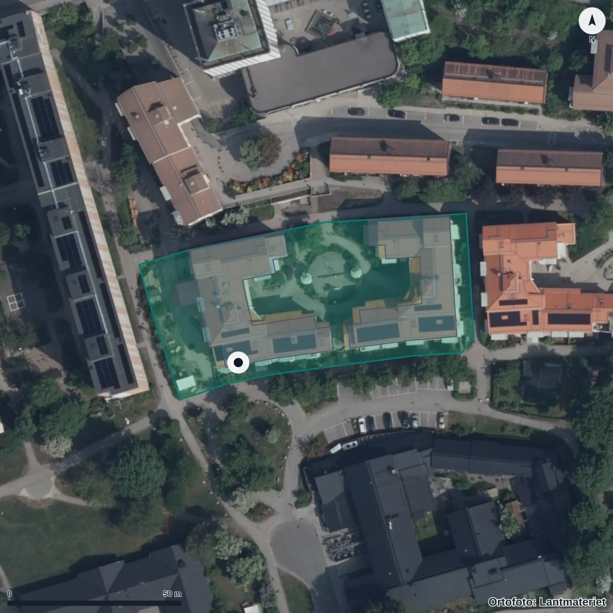 Flygbild över Förskolan Krukmakaren, Pysslingen, ortofoto från Lantmäteriet