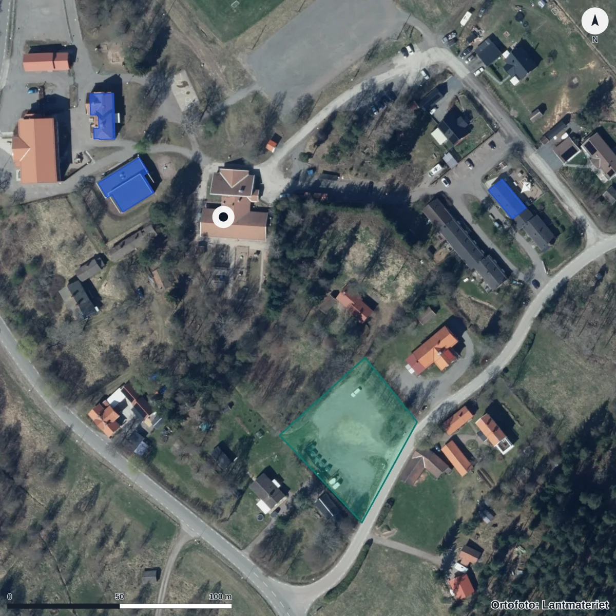 Flygbild över Förskolan Aspelunden, ortofoto från Lantmäteriet