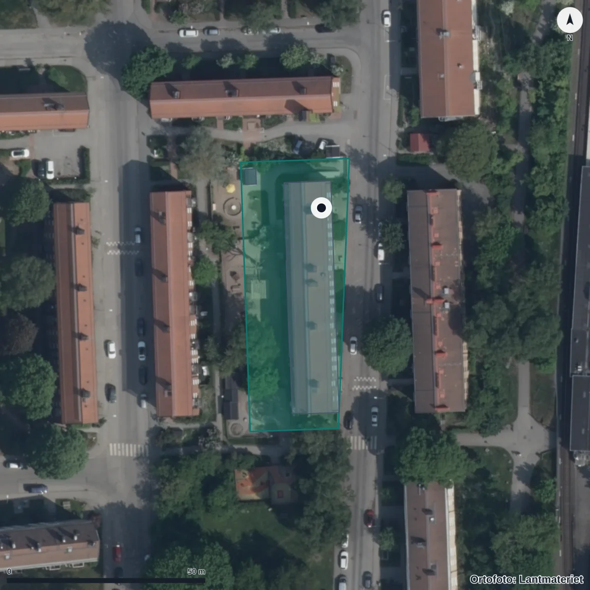Flygbild över Förskolan Blåsutgården, ortofoto från Lantmäteriet