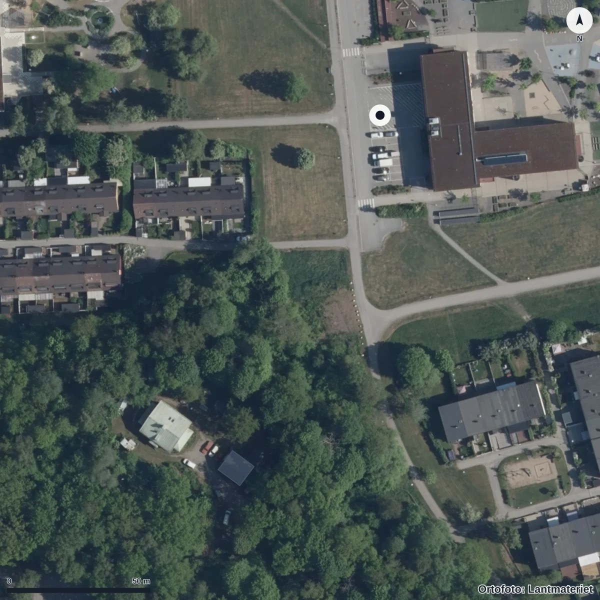 Flygbild över Förskolan Tranan, ortofoto från Lantmäteriet