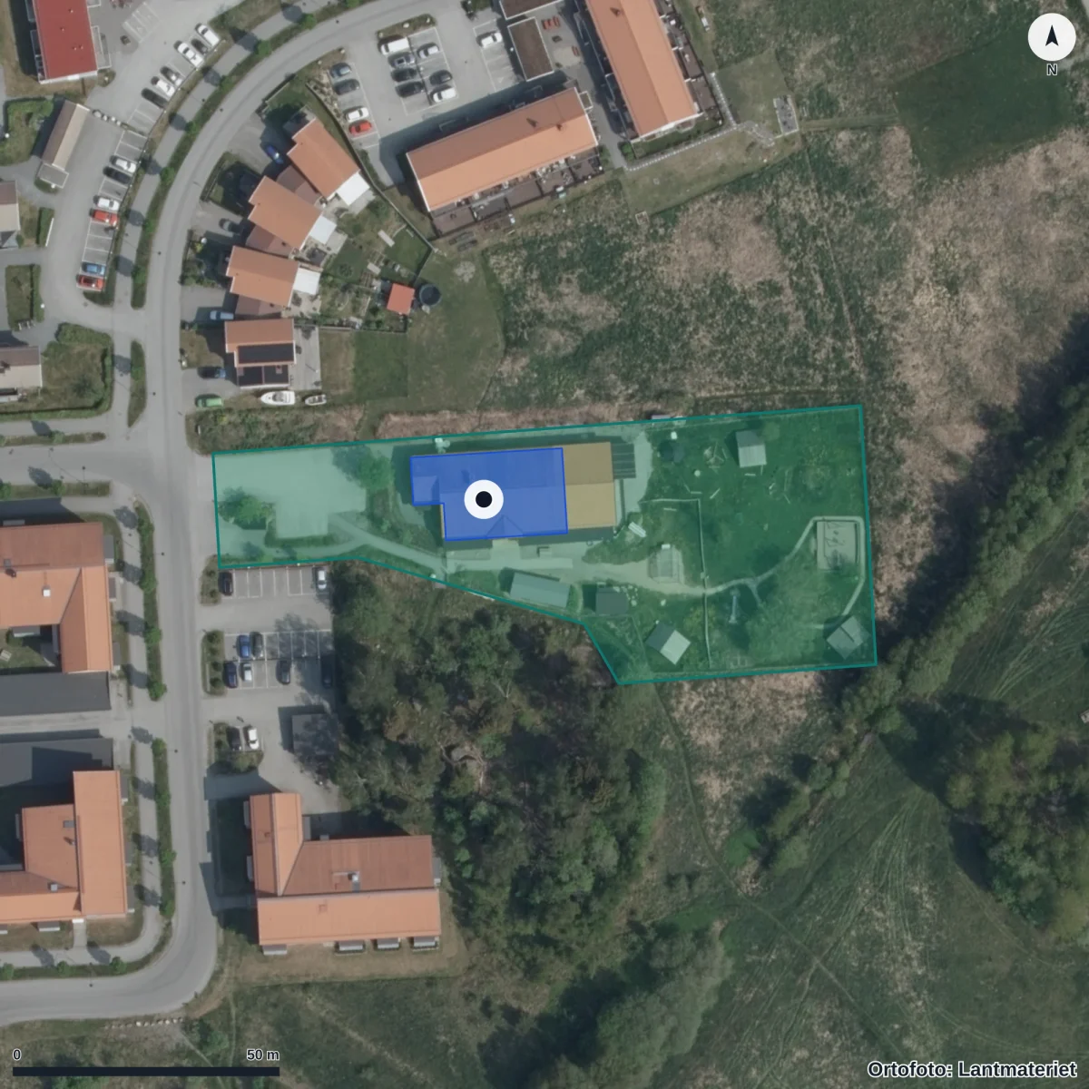 Flygbild över Förskolan Naturbarnstugan I Norrtälje AB, ortofoto från Lantmäteriet