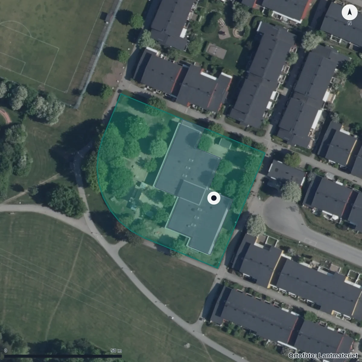 Flygbild över Förskolan Trädgården, ortofoto från Lantmäteriet