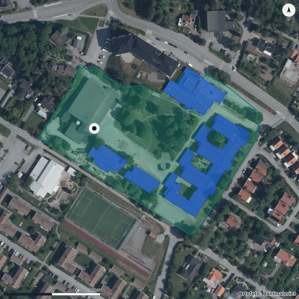 Flygbild över Vallmon Nya Förskola, ortofoto från Lantmäteriet