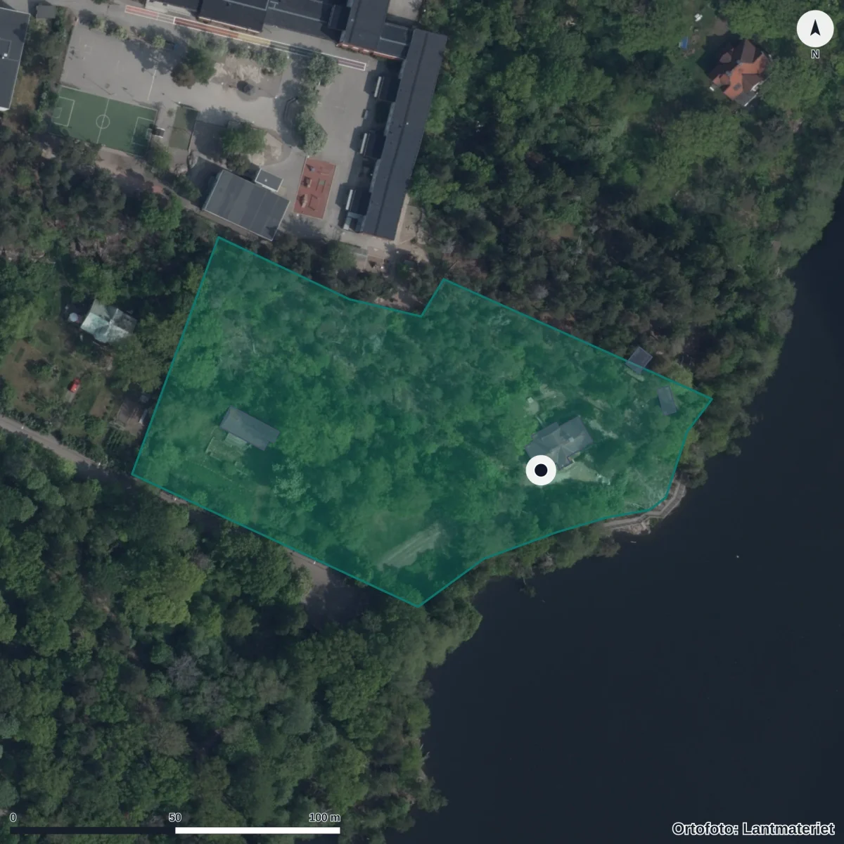 Flygbild över Förskolan Solrosen Martingården, ortofoto från Lantmäteriet