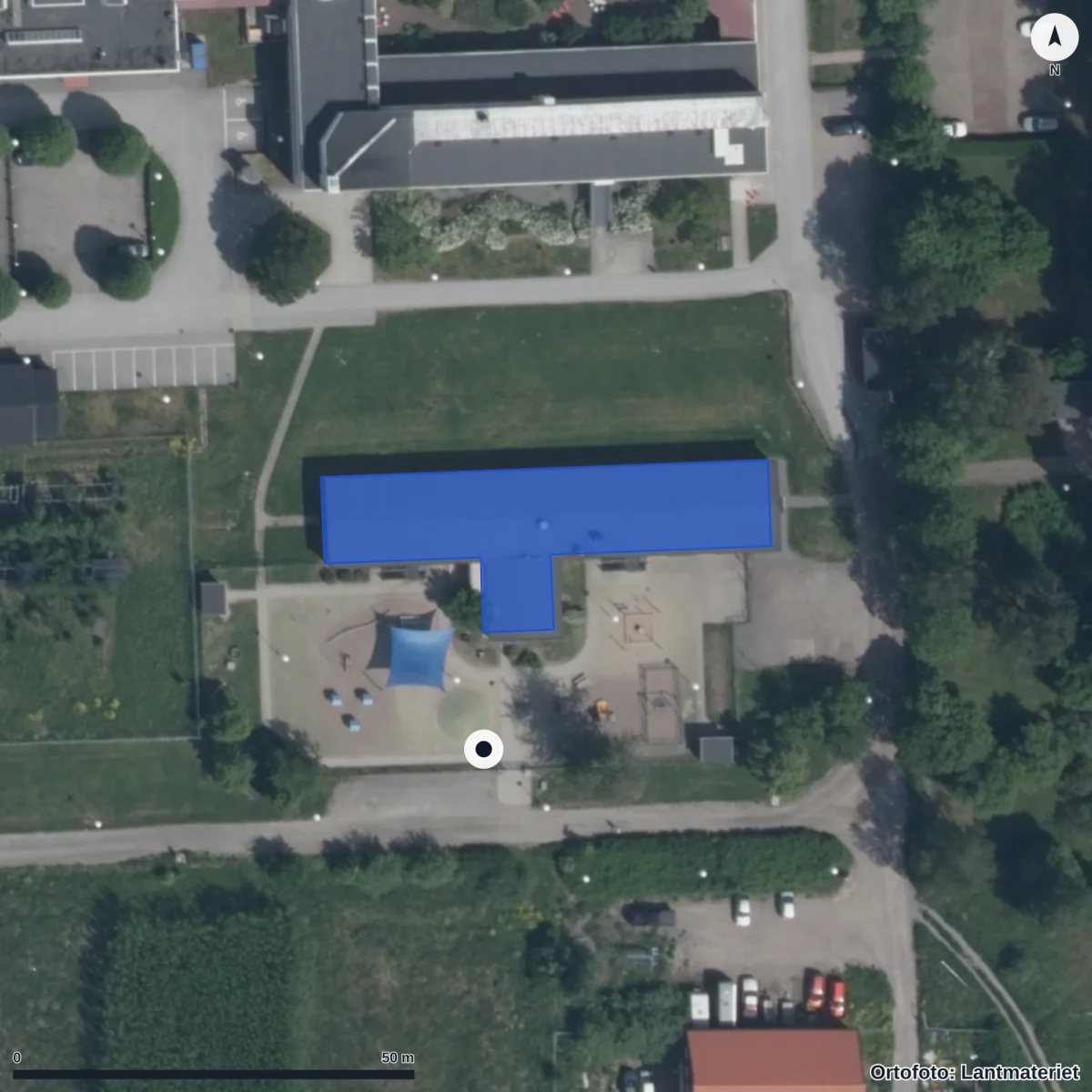 Flygbild över Cas Djäknen, ortofoto från Lantmäteriet