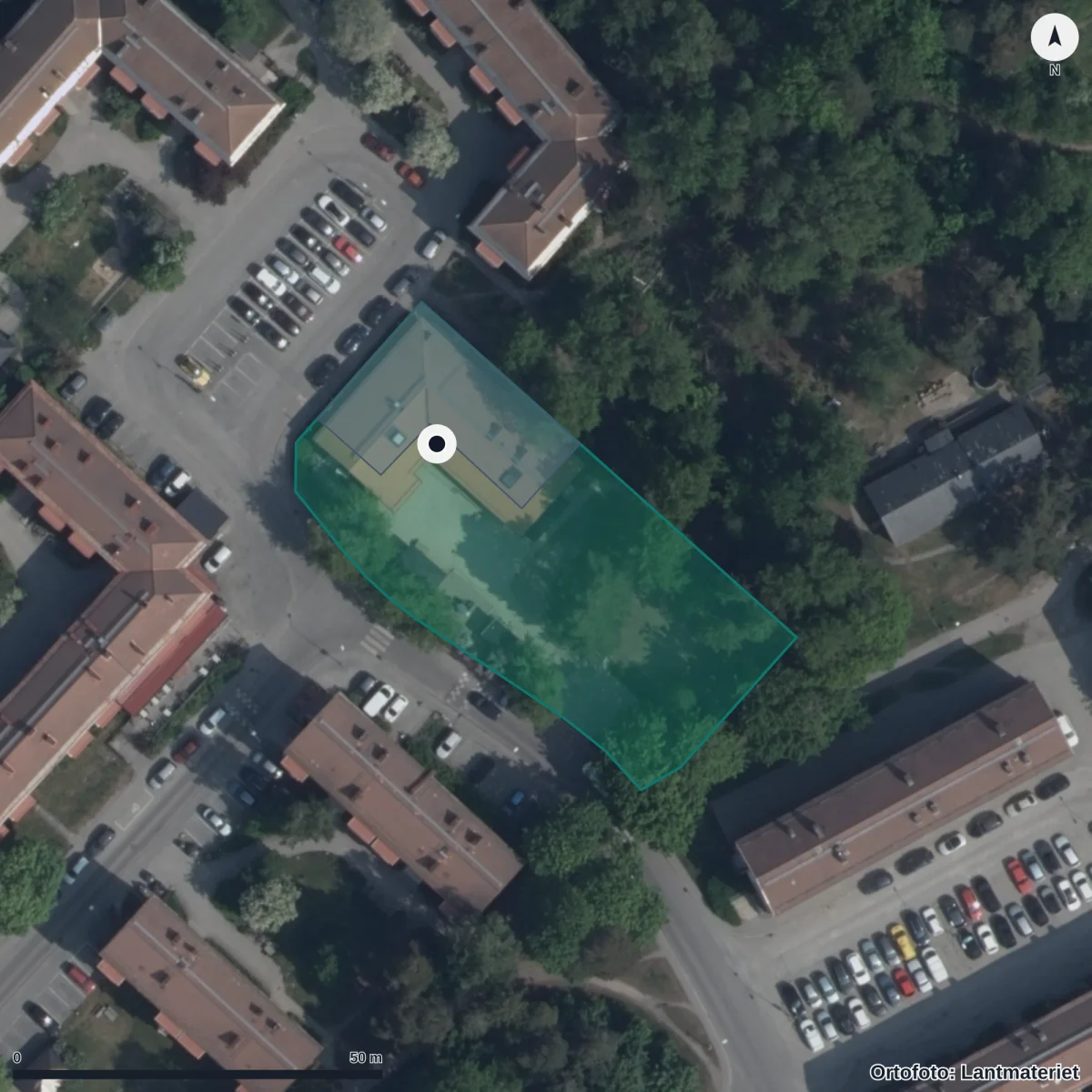 Flygbild över Förskolan Tallbacken, ortofoto från Lantmäteriet