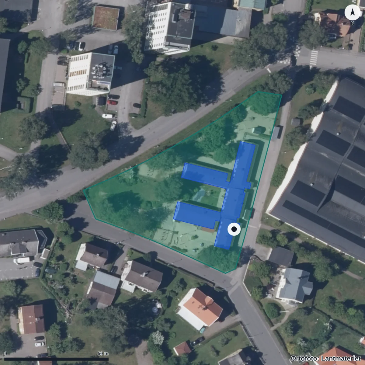 Flygbild över Förskolan Regnbågen, ortofoto från Lantmäteriet