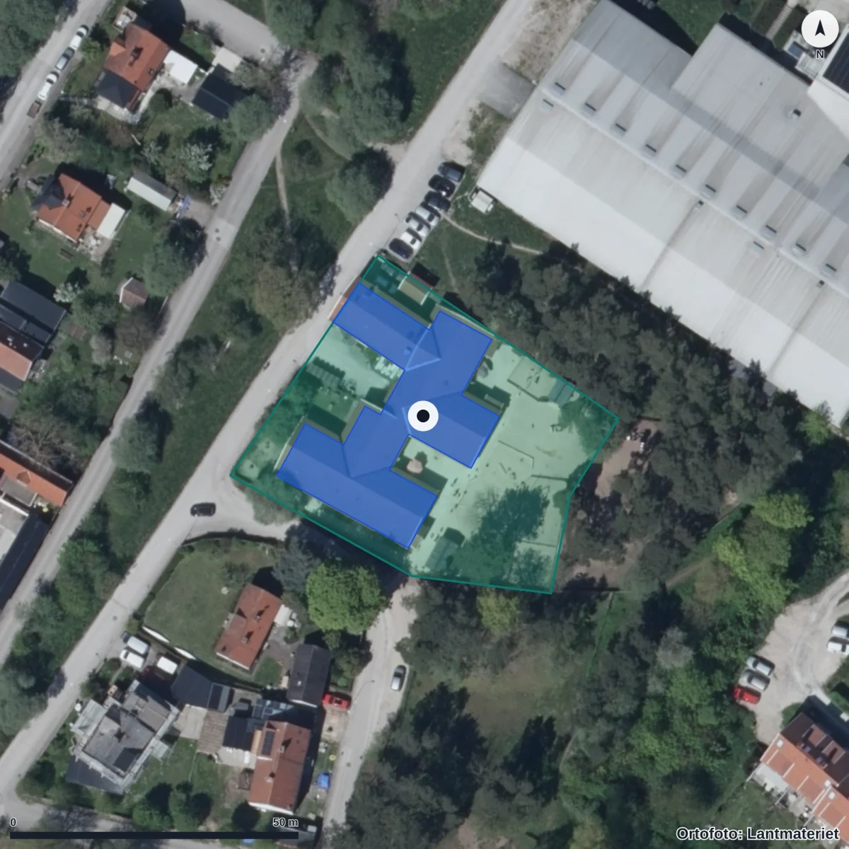 Flygbild över Forellen Förskola, ortofoto från Lantmäteriet