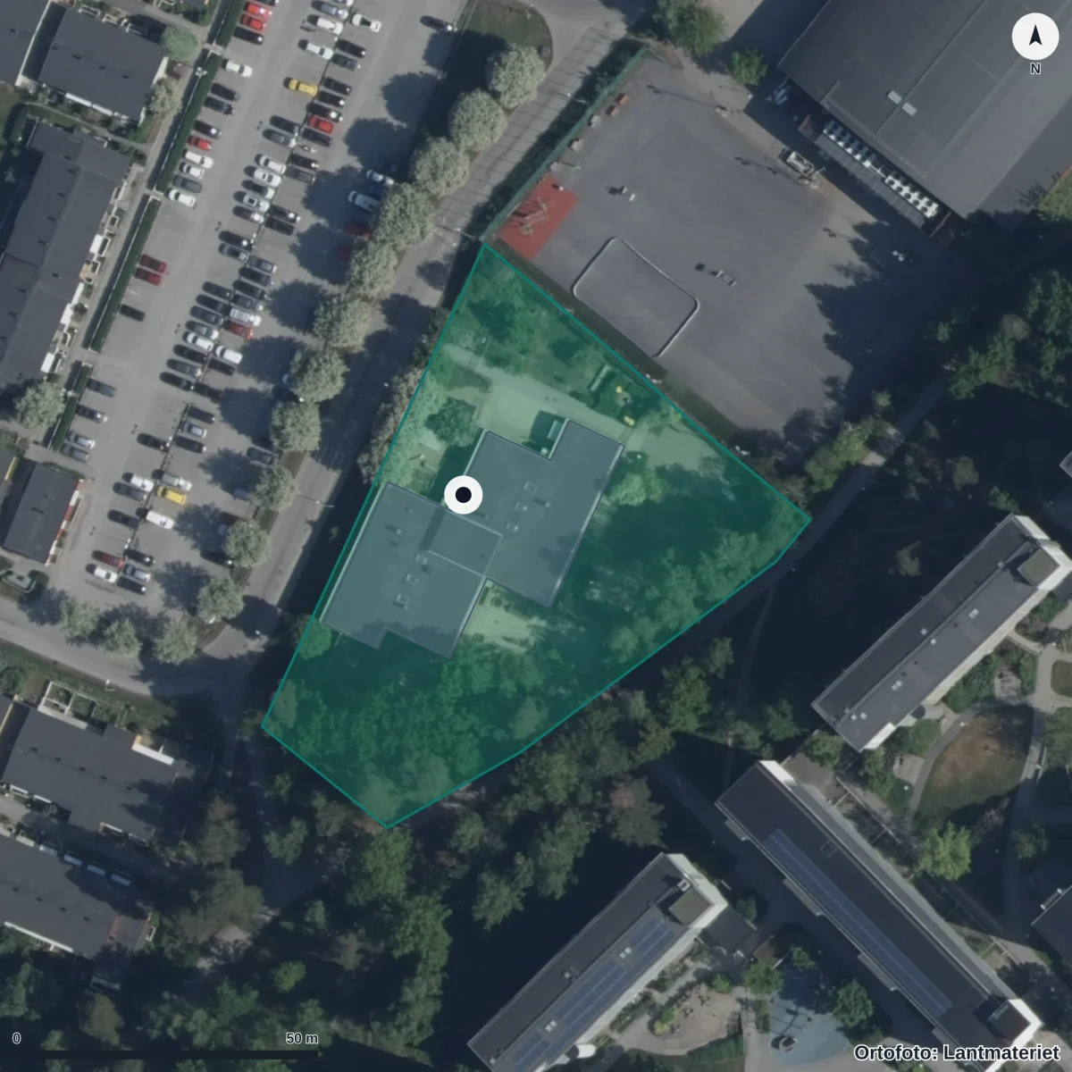 Flygbild över Förskolan Trollskogen, ortofoto från Lantmäteriet