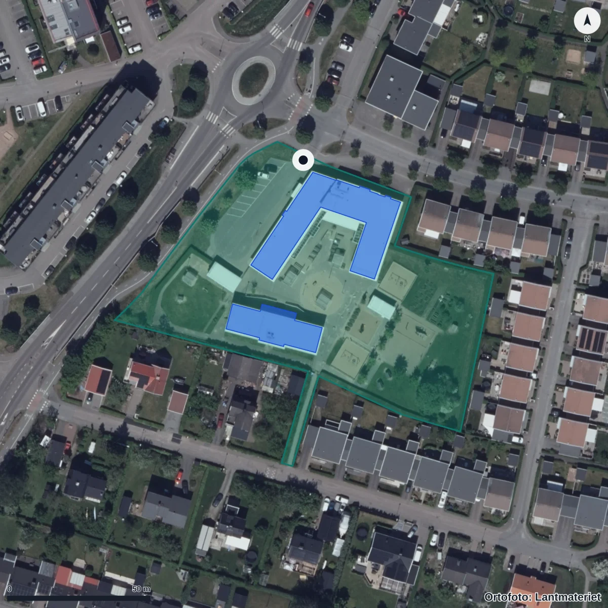 Flygbild över Taklöksvägen 1 Förskola, ortofoto från Lantmäteriet
