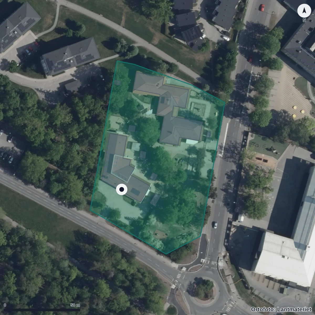 Flygbild över Förskolan Muminstugan, ortofoto från Lantmäteriet