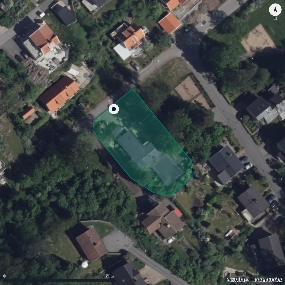 Flygbild över Friskolan Kvarnhjulet, ortofoto från Lantmäteriet