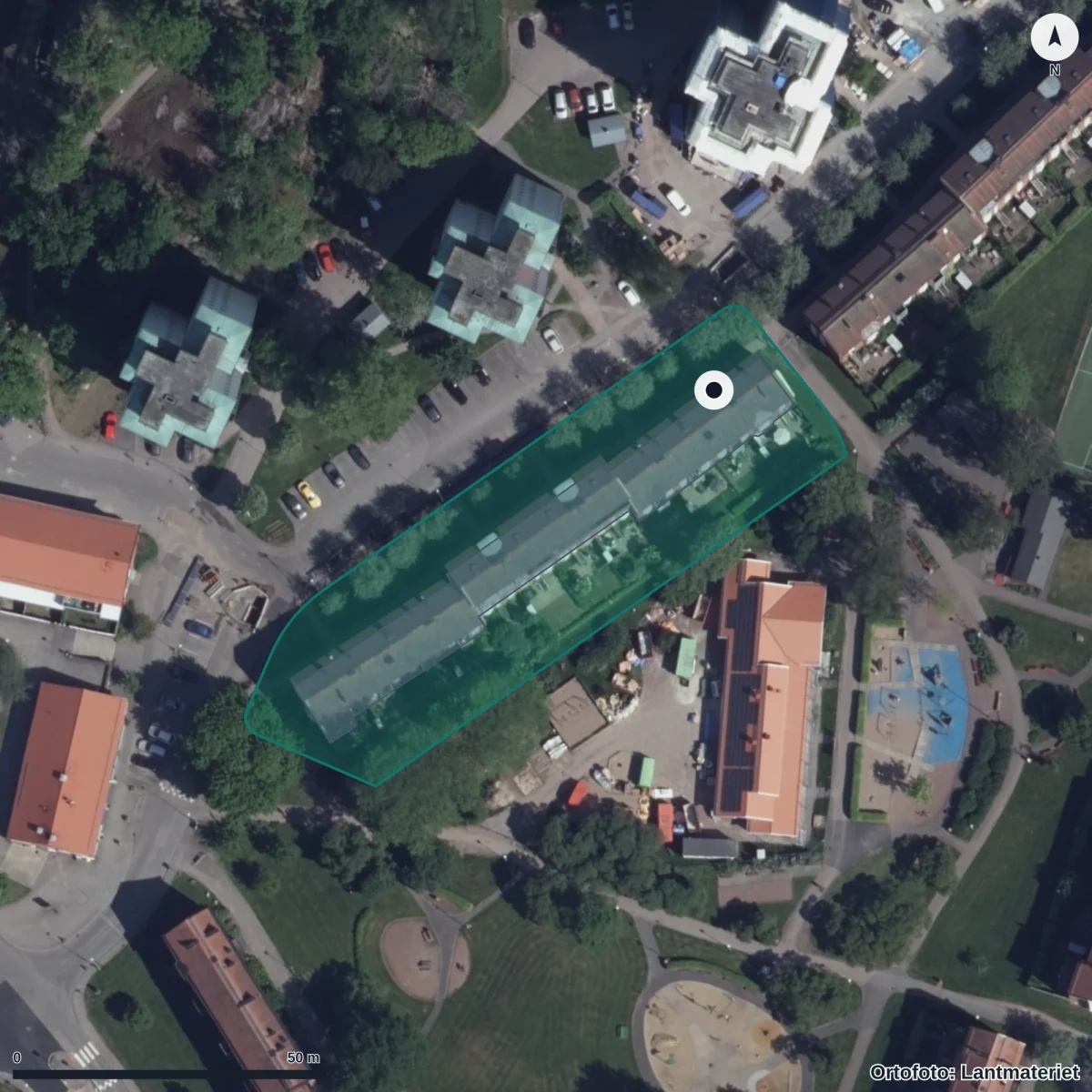 Flygbild över Kalendervägen 15-17 Förskola, ortofoto från Lantmäteriet