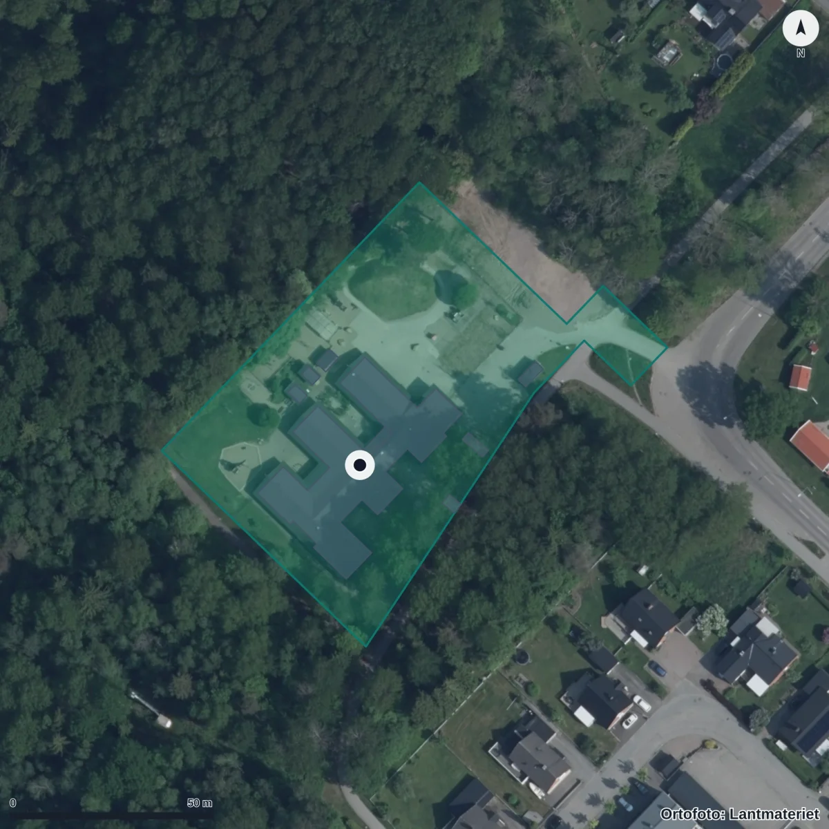 Flygbild över Olsbackagården, ortofoto från Lantmäteriet