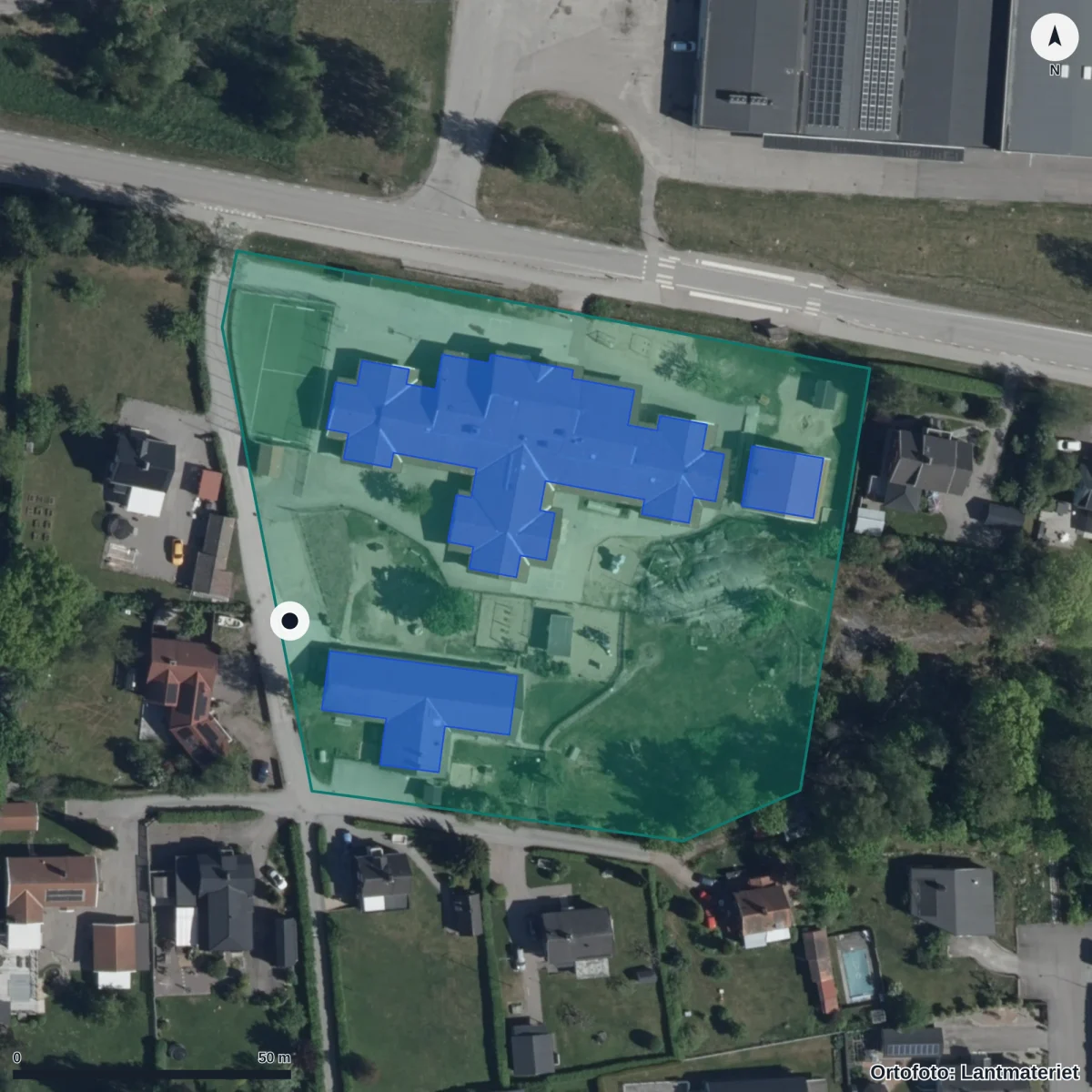 Flygbild över Bergshammars Förskola, ortofoto från Lantmäteriet