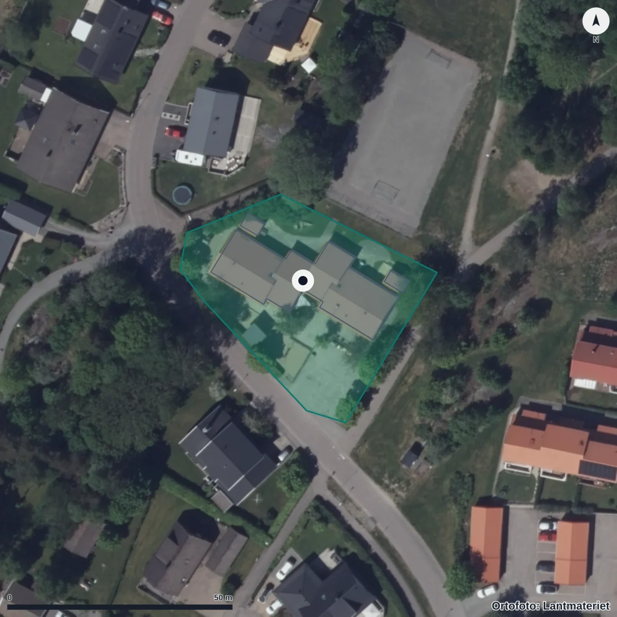 Flygbild över Klockarebolet Förskola, ortofoto från Lantmäteriet