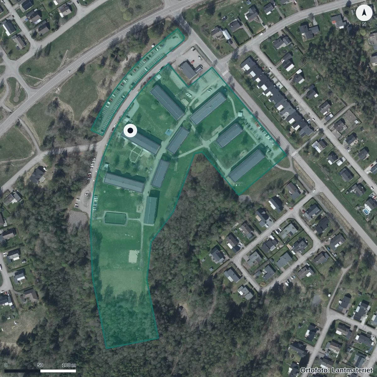 Flygbild över Regnbågen Förskola, ortofoto från Lantmäteriet