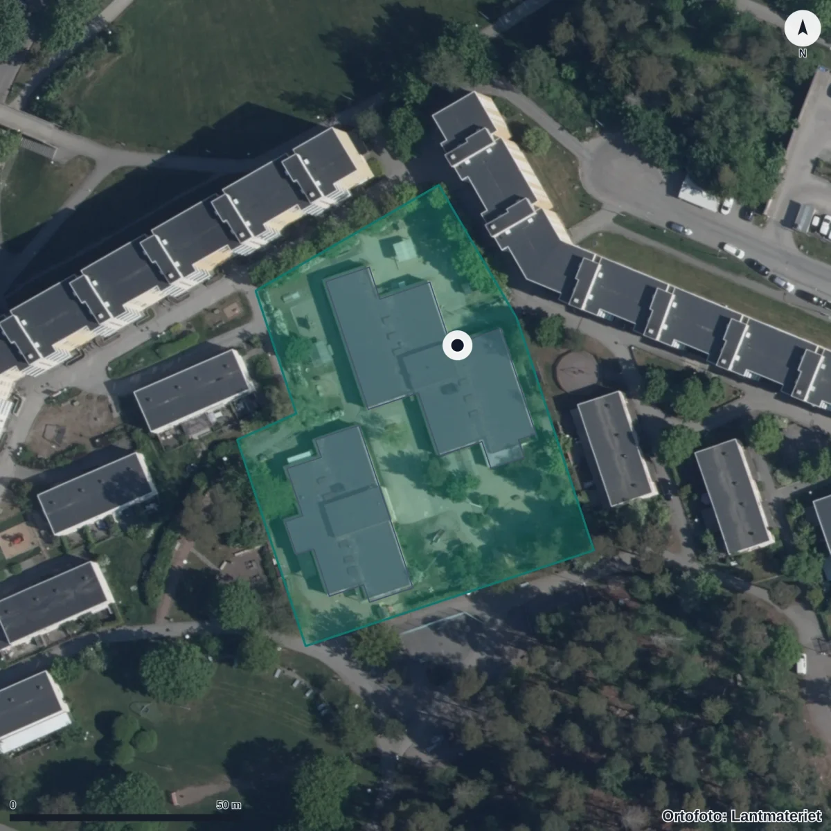 Flygbild över Förskolan Barnkullen, ortofoto från Lantmäteriet