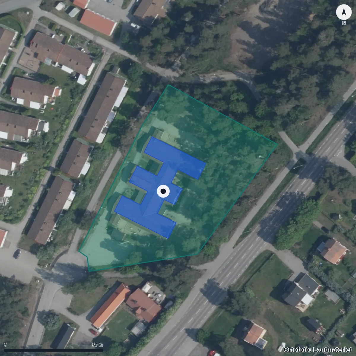 Flygbild över Tallåsgården, ortofoto från Lantmäteriet