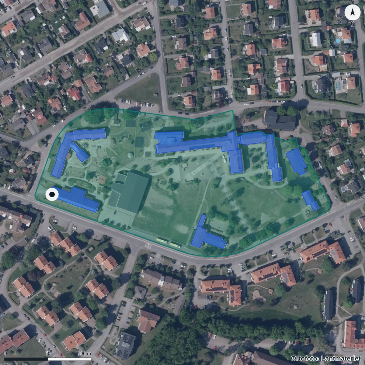 Flygbild över Förskolan Vallmon, ortofoto från Lantmäteriet
