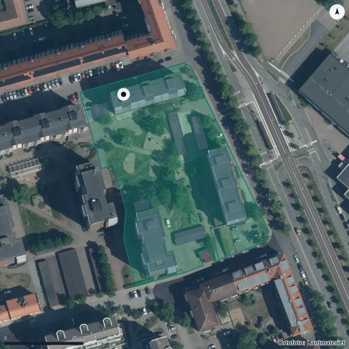 Flygbild över Nyponrosens Förskola, ortofoto från Lantmäteriet