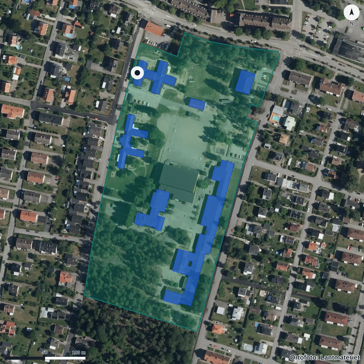 Flygbild över Förskolan Trädgården, ortofoto från Lantmäteriet