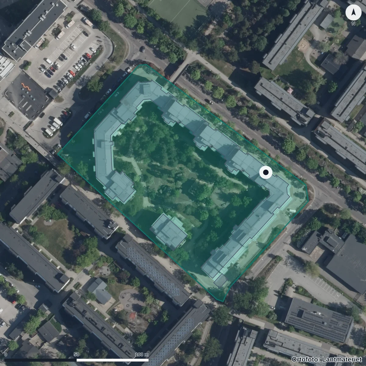 Flygbild över Kardemumma Förskola, Dovregatan, ortofoto från Lantmäteriet