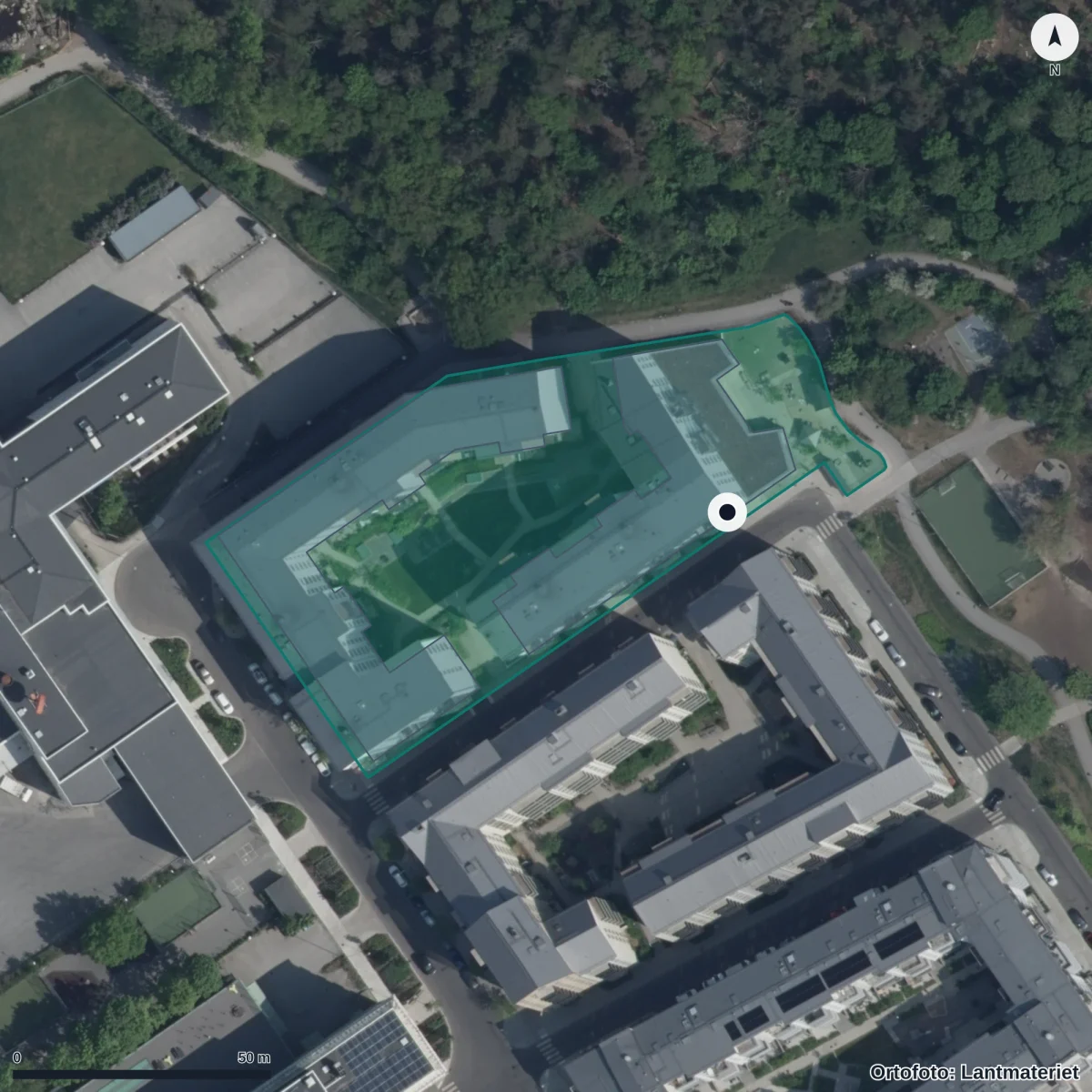 Flygbild över Förskolan Skattkistan, ortofoto från Lantmäteriet