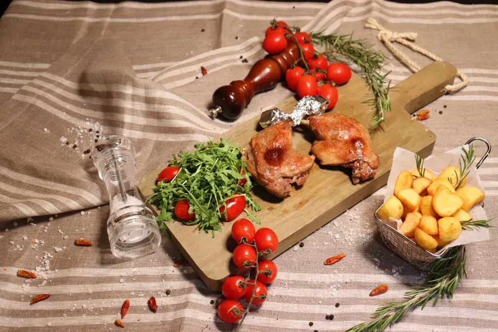 Cosce di anatra con patate al forno