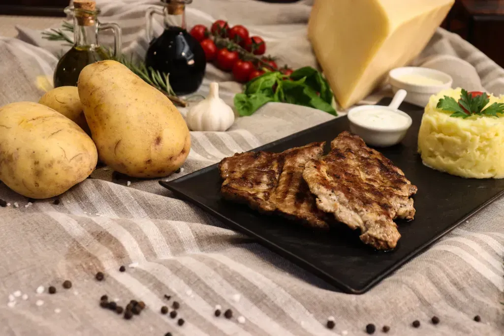 Capocollo fresco alla griglia con patate