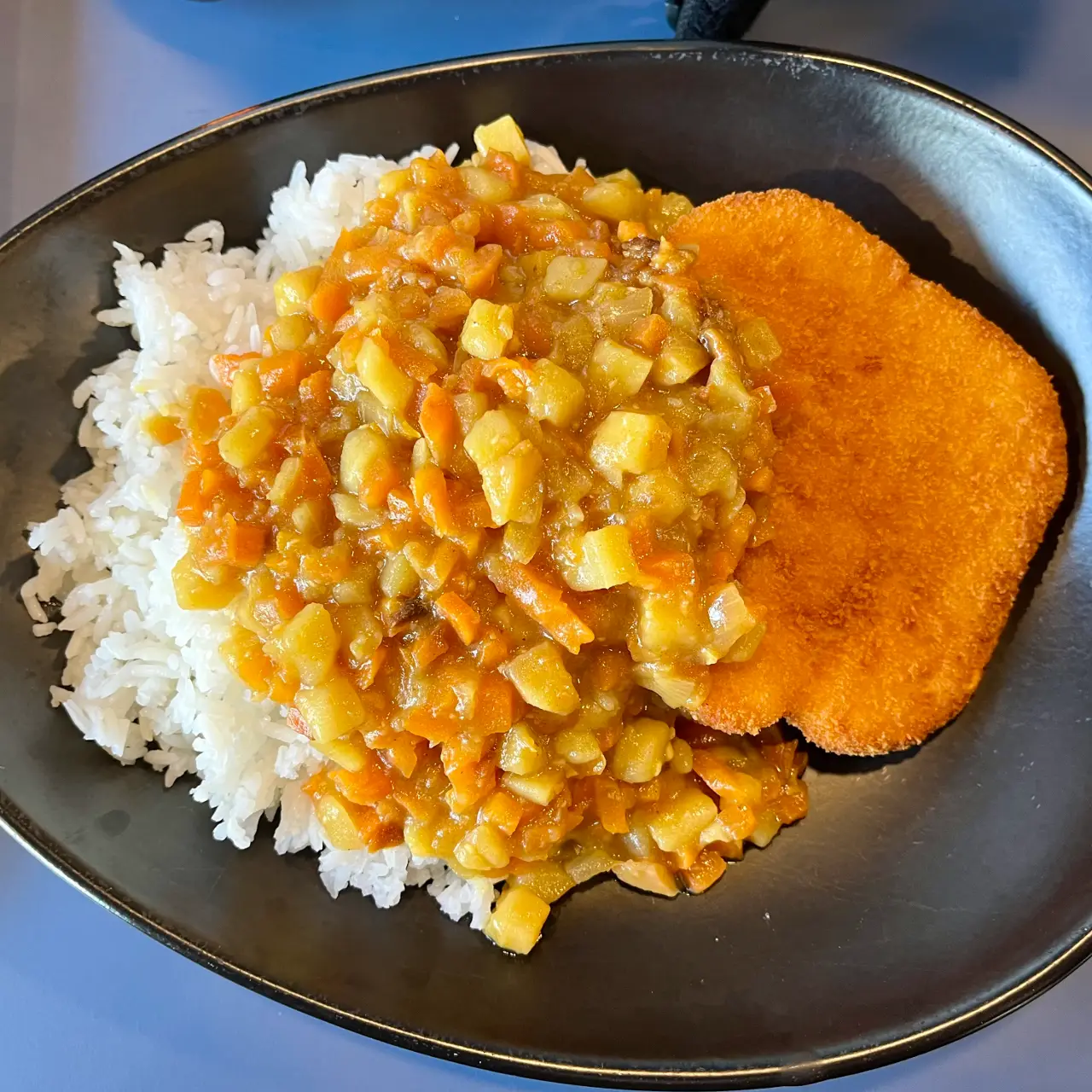 The Remarkables Ski Area - Katsu curry - crumbed schnitzel and curry sauce on…