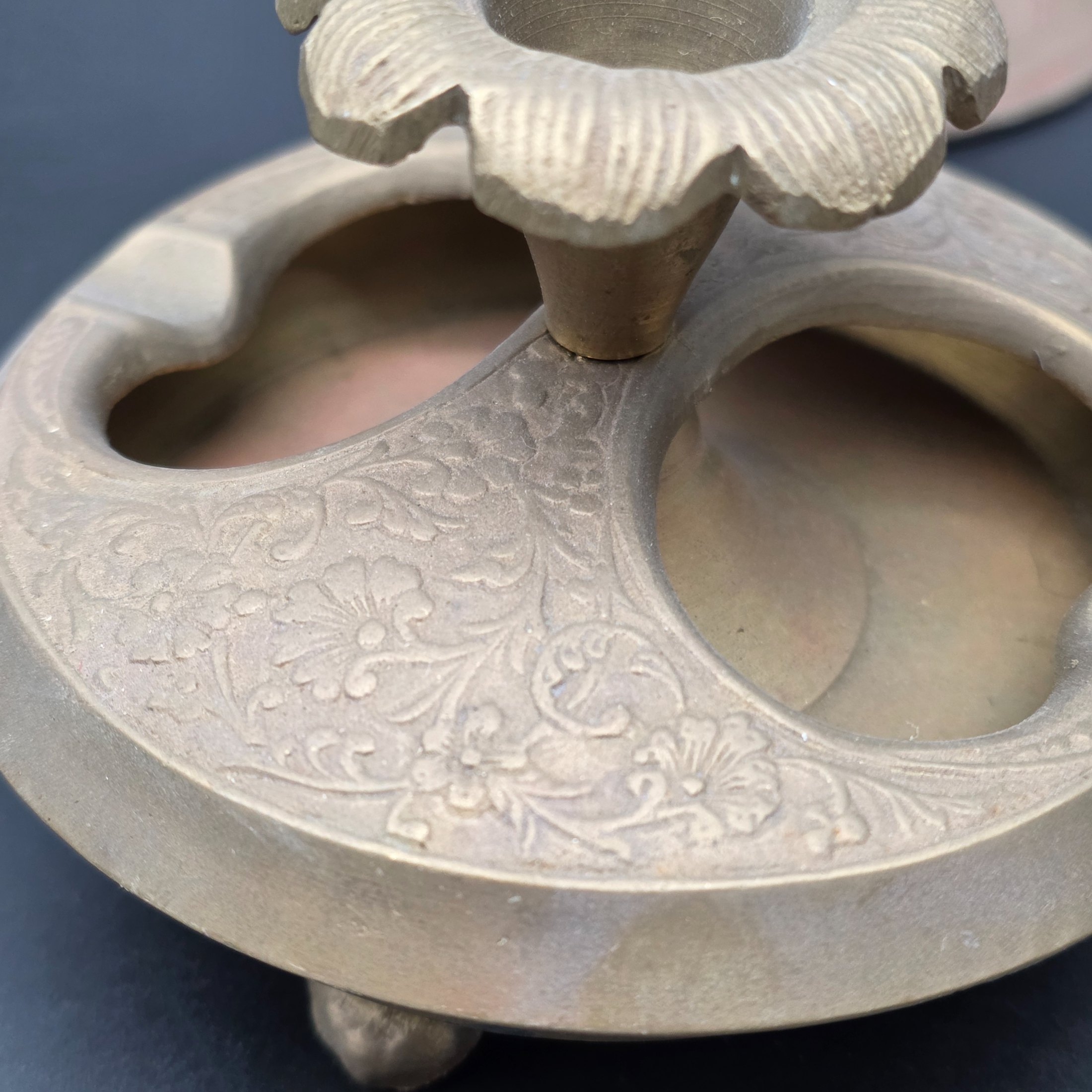 A curated collection of vintage decorative brass items, likely from the mid-20th century, featuring various engraved, enameled, and glazed finishes. - View 4