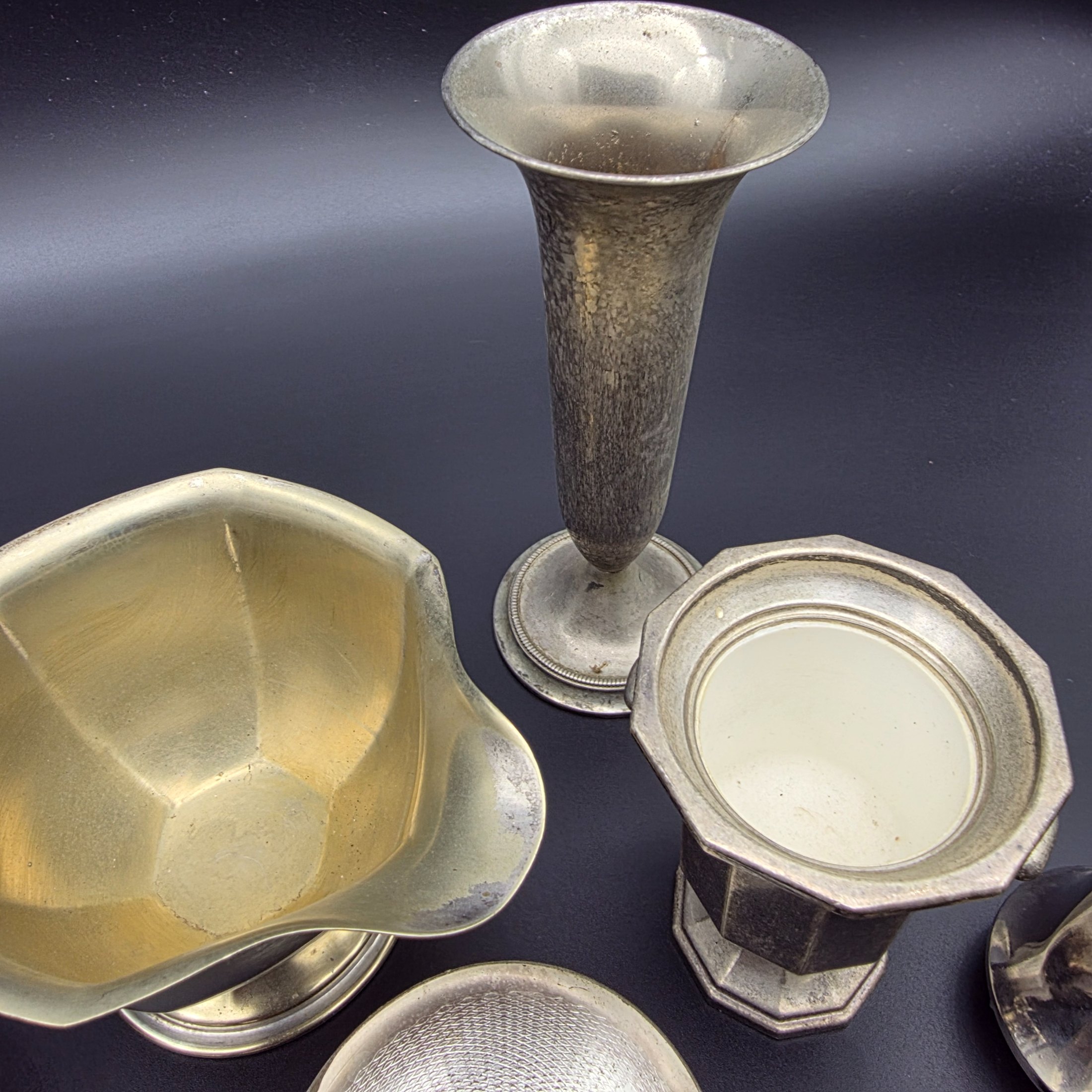A diverse collection of vintage English silver-plated homewares, featuring various decorative and functional pieces. - View 5