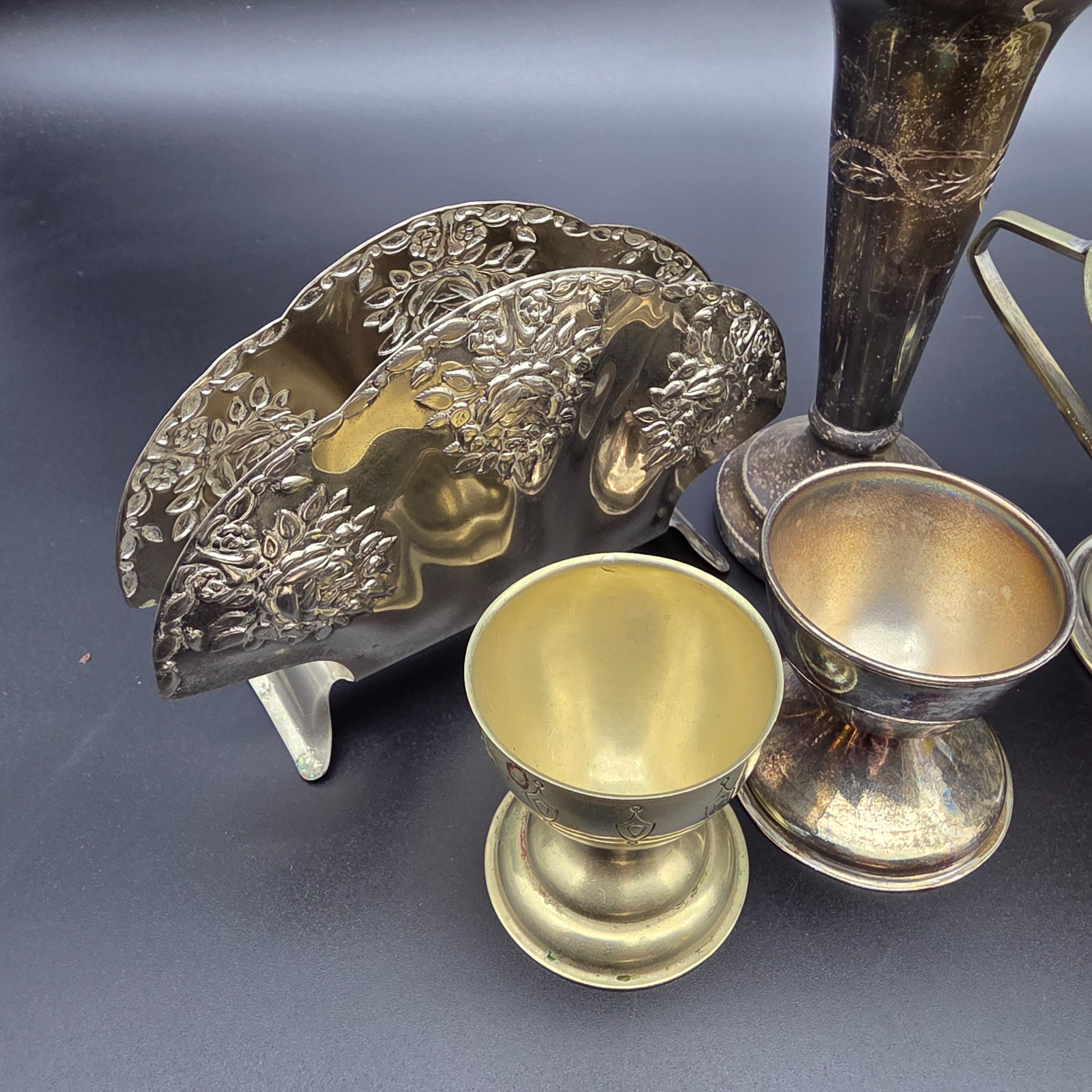 A diverse collection of vintage English silver-plated homewares, featuring various decorative and functional pieces. - View 8