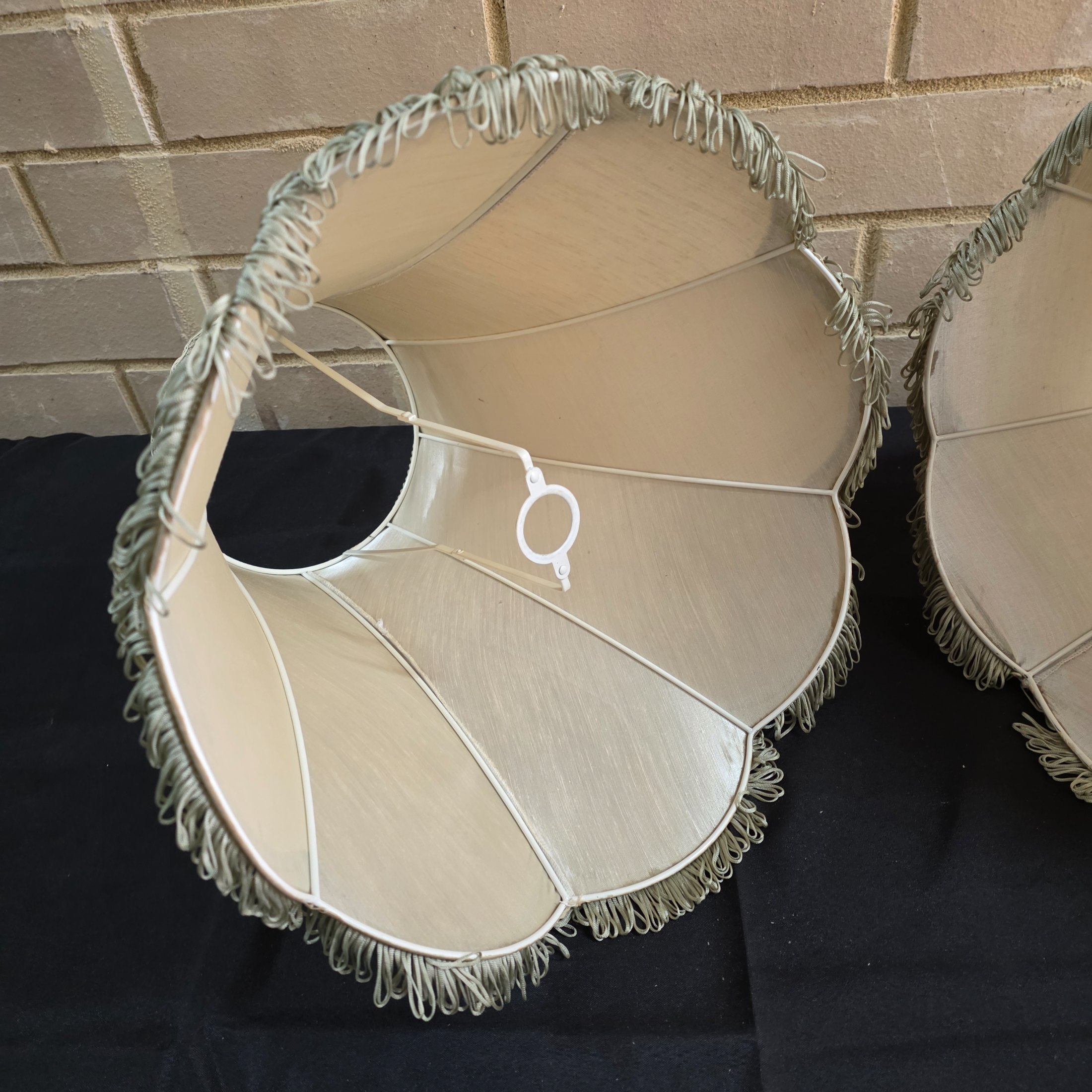 A pair of vintage bell-shaped lampshades, crafted from light fabric with ornate trim and fringe, suitable for traditional interior decor. - View 7