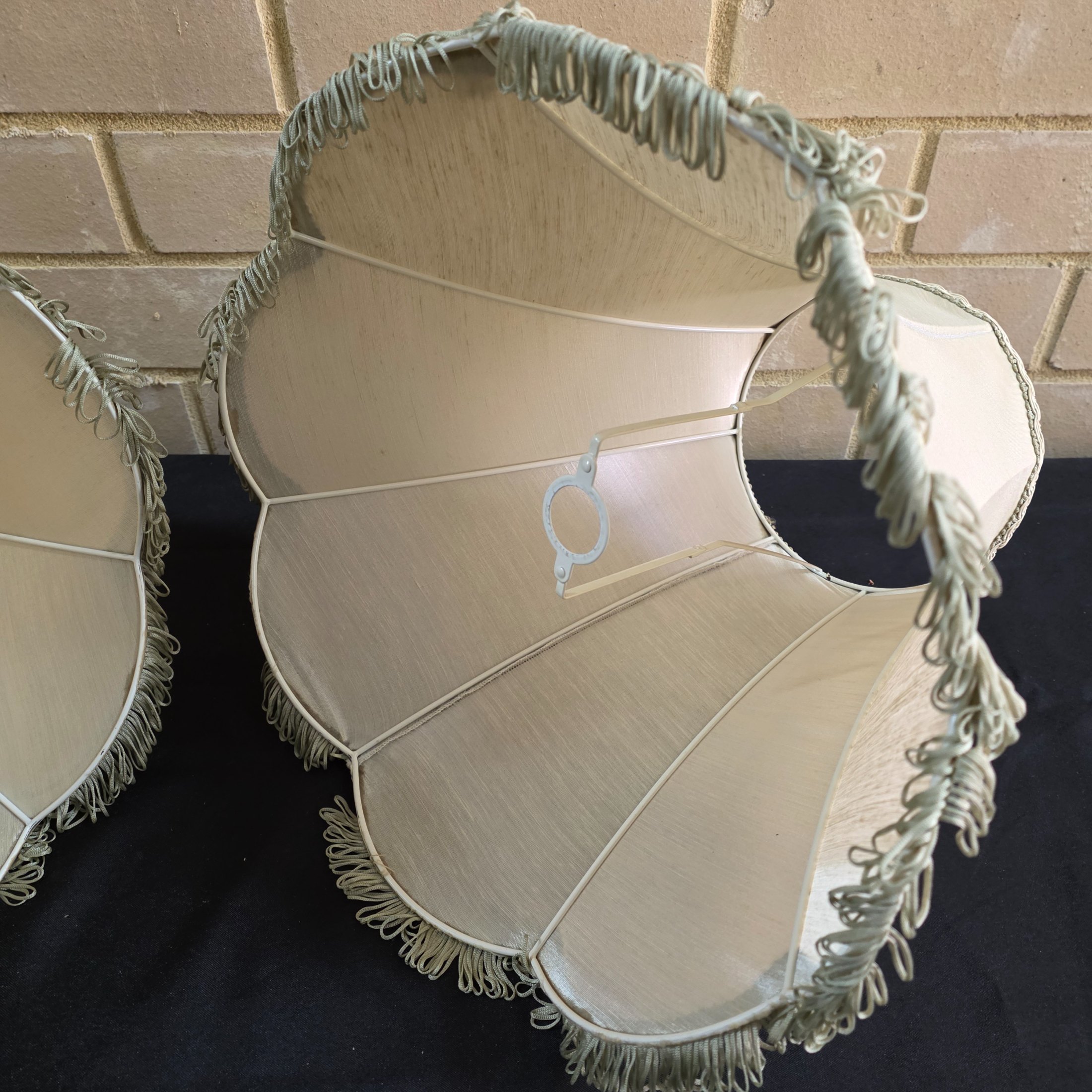 A pair of vintage bell-shaped lampshades, crafted from light fabric with ornate trim and fringe, suitable for traditional interior decor. - View 8