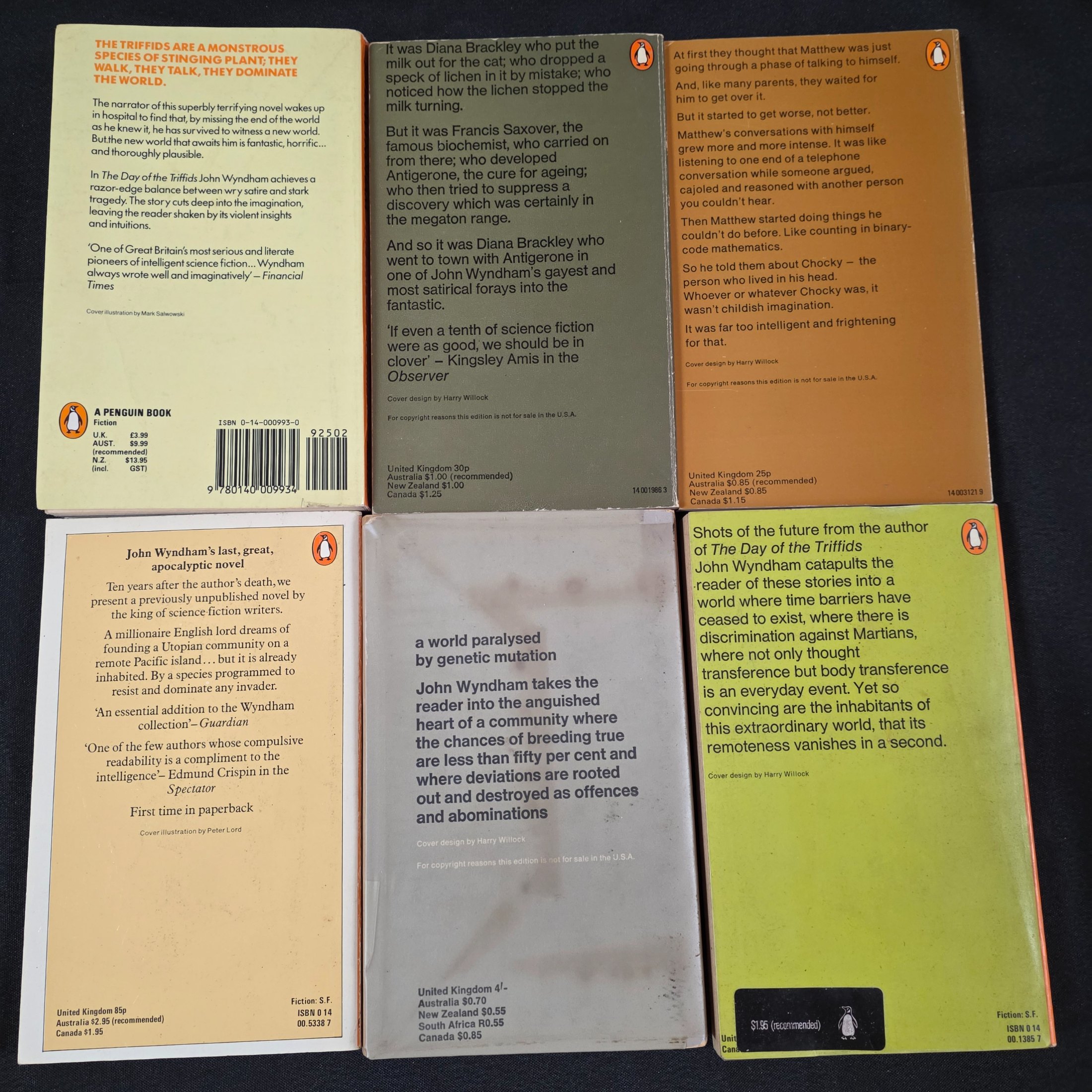 A collection of six vintage paperback science fiction novels by John Wyndham, featuring classic Penguin cover art. - View 2