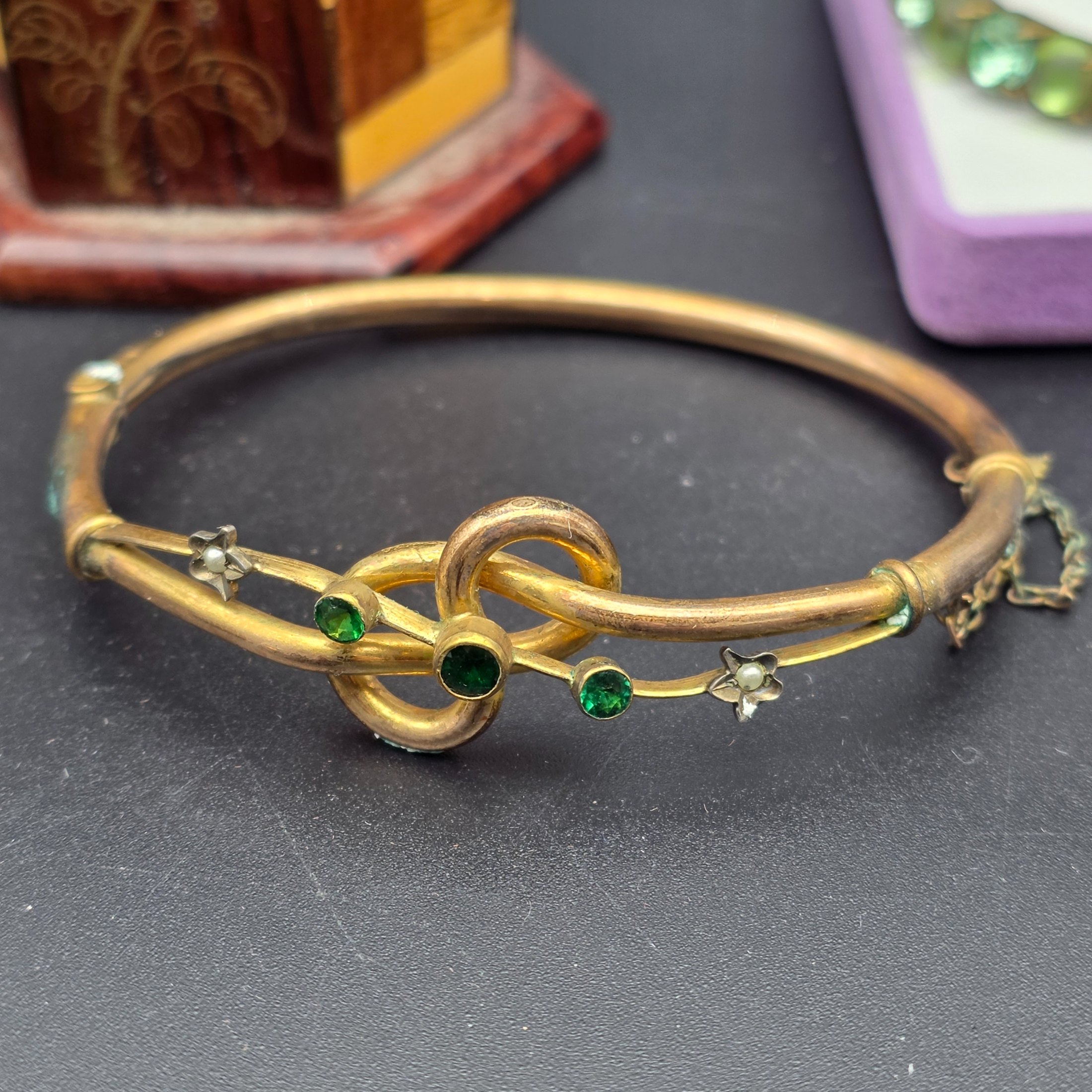 A diverse lot of vintage decorative sundries, featuring costume jewellery and a unique inlaid wooden box, offering a varied collection for enthusiasts of vintage accessories. - View 2