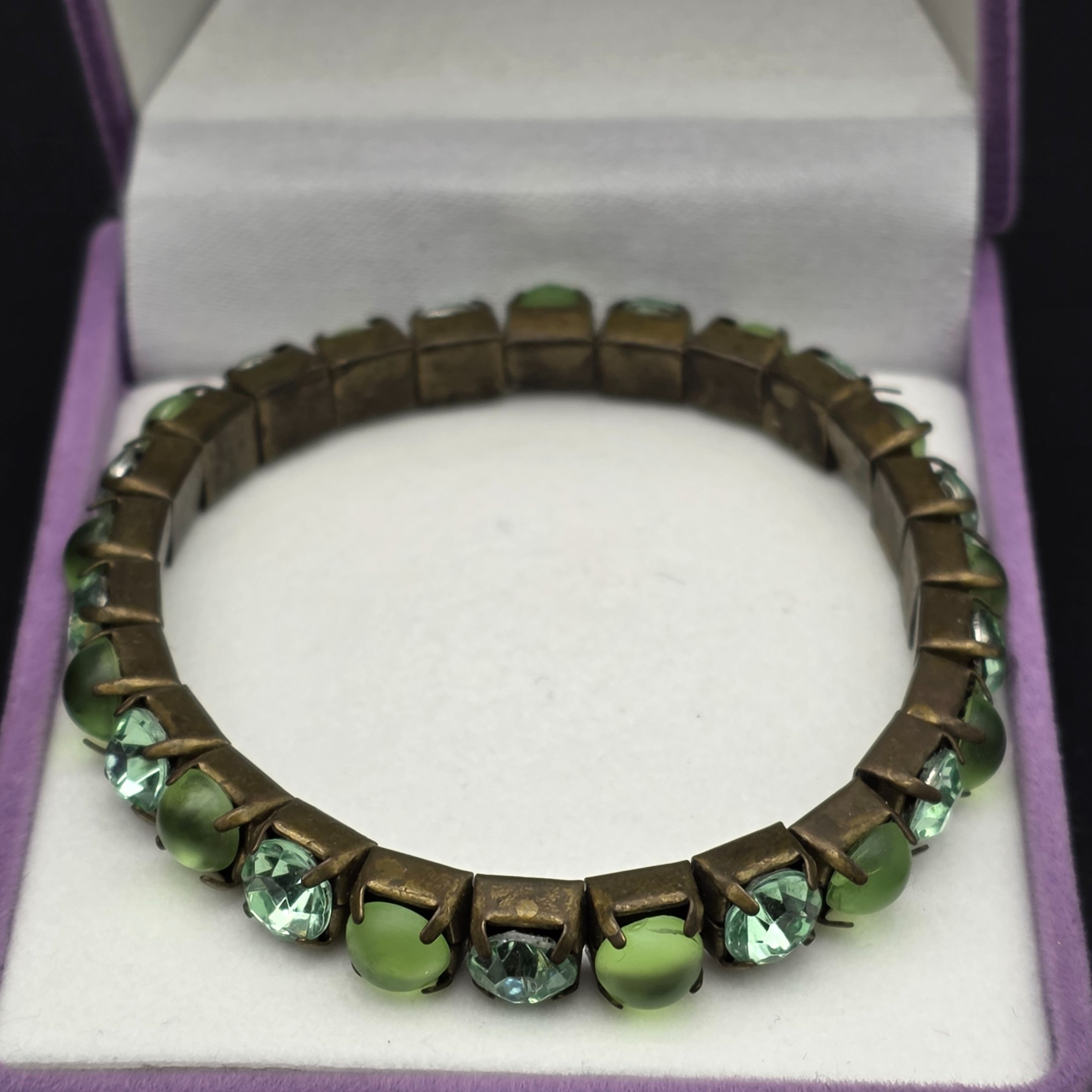 A diverse lot of vintage decorative sundries, featuring costume jewellery and a unique inlaid wooden box, offering a varied collection for enthusiasts of vintage accessories. - View 7