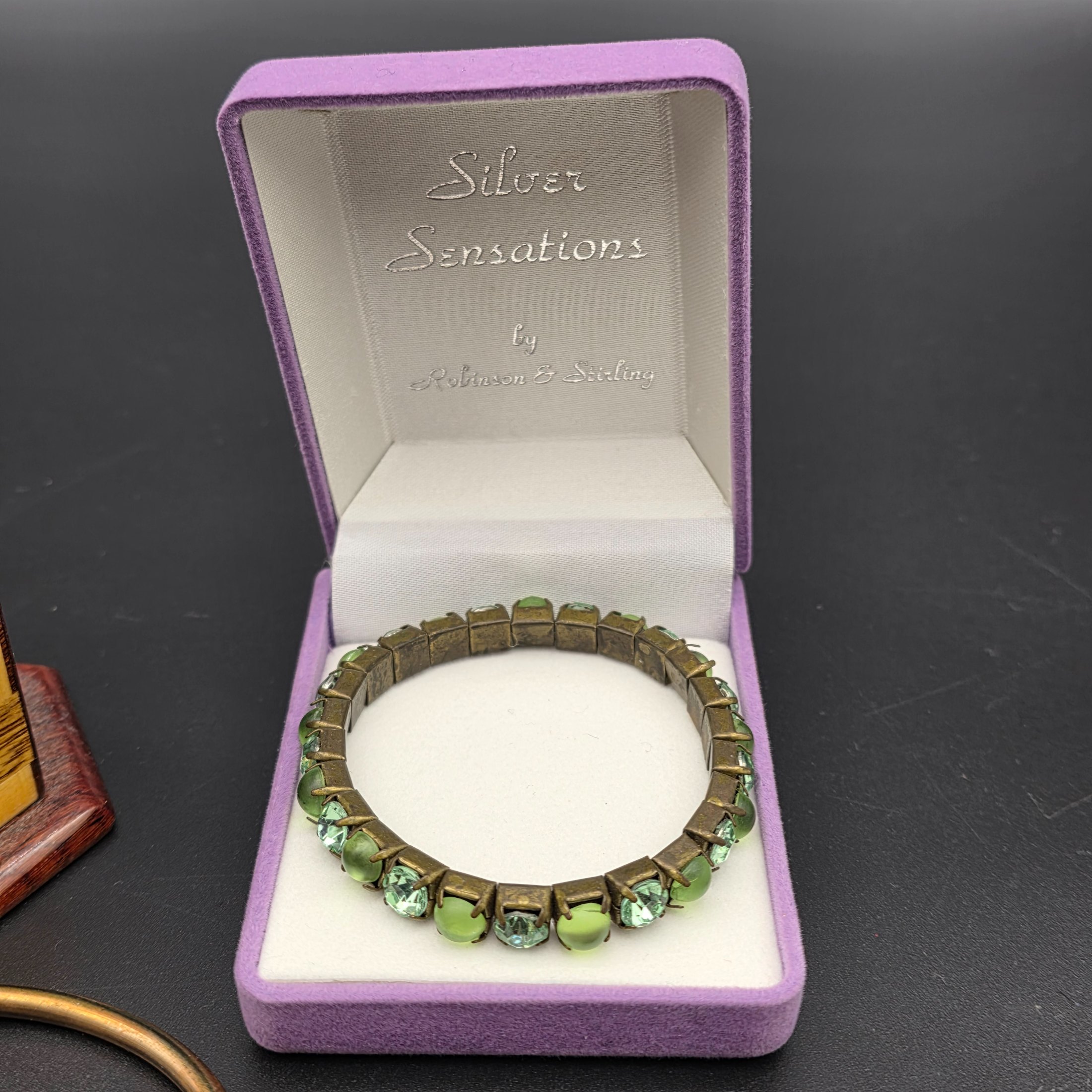 A diverse lot of vintage decorative sundries, featuring costume jewellery and a unique inlaid wooden box, offering a varied collection for enthusiasts of vintage accessories. - View 8